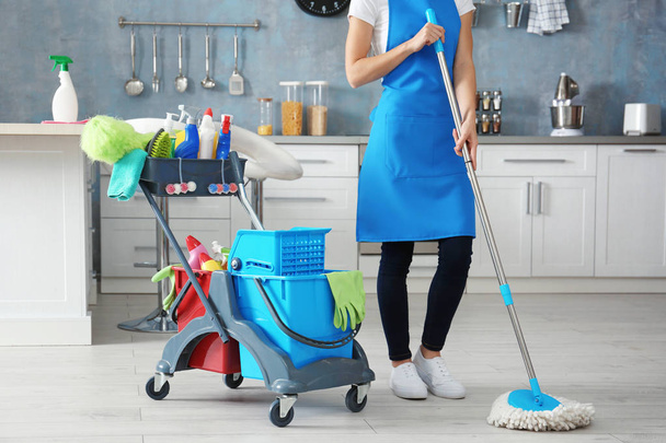 Woman with cleaning tools - Foto, Bild