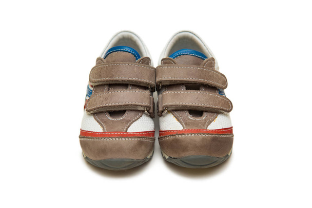 Zapatos de bebé aislados en el fondo blanco
 - Foto, Imagen