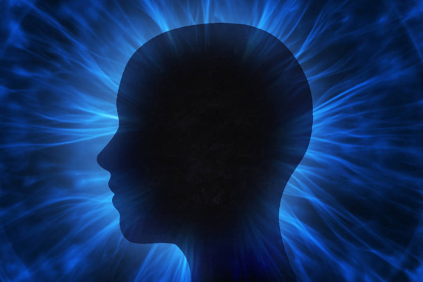 Menselijk hoofd met energie atoom stralen - Foto, afbeelding