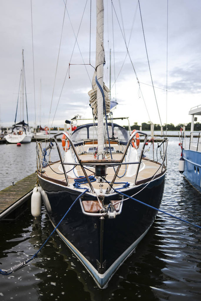 Single sailboat anchored in marine, Poland, Kamien Pomorski - Photo, Image