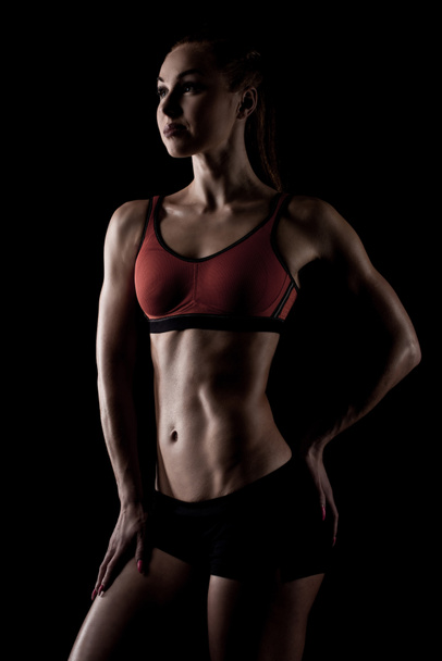 sportswoman posing in sportswear - Фото, изображение