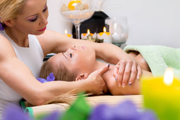 Beautiful young woman getting spa massage - Photo, Image