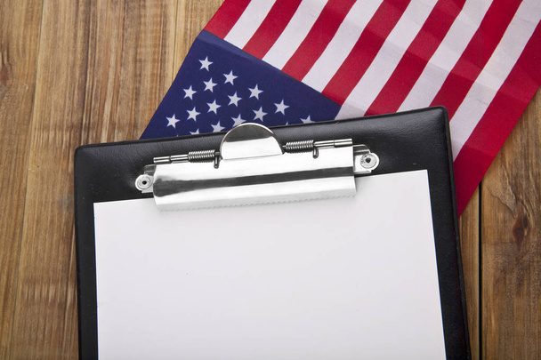 blank clip board and USA flag - Foto, Imagen