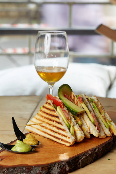Vegan Club Sandwich with avocado on wooden tray - Zdjęcie, obraz