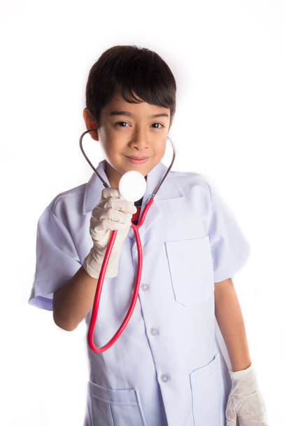 Маленька дитина в костюмі лікаря
 - Фото, зображення