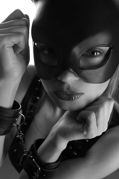 Woman with fetish mask - 写真・画像
