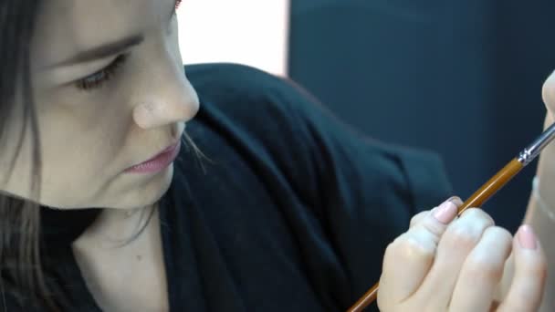 Manicurist making fashion nailart. Woman Applying Nail Polish.  - Footage, Video