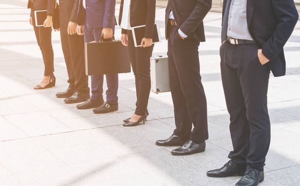 Business people standing in a row - Φωτογραφία, εικόνα