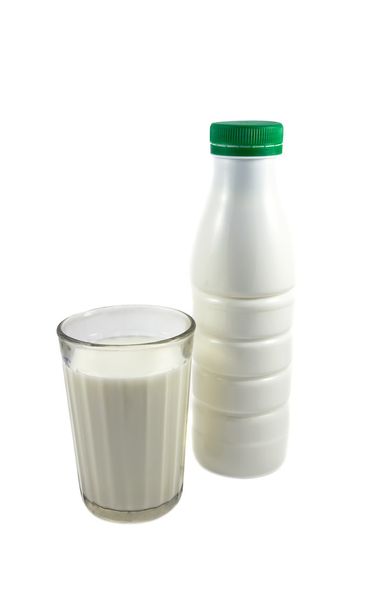 Bottle and glass with milk - Фото, зображення