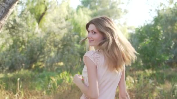 woman posing on nature - Filmati, video