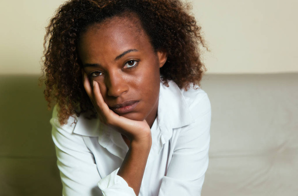 Sad african american woman with depression looking at camera - Fotó, kép