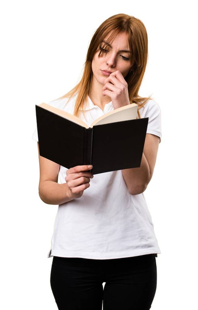 Beautiful young girl reading book - Zdjęcie, obraz