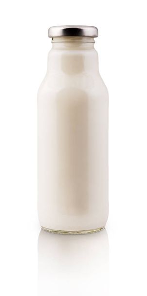 Detox drink. Coconut almond milk in bottle isolated - Foto, afbeelding