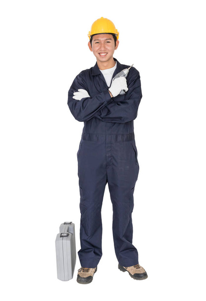 Young handyman  standing with his tool box - Foto, imagen