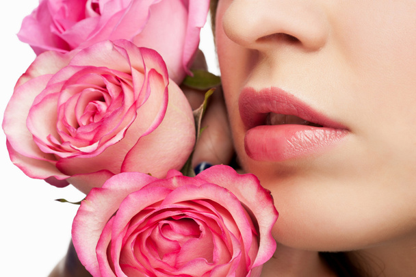 Female lips with roses - Foto, Imagen