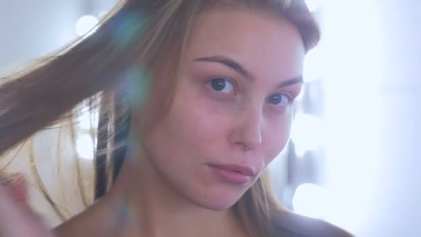 Portrait of pretty woman without makeup - Filmati, video