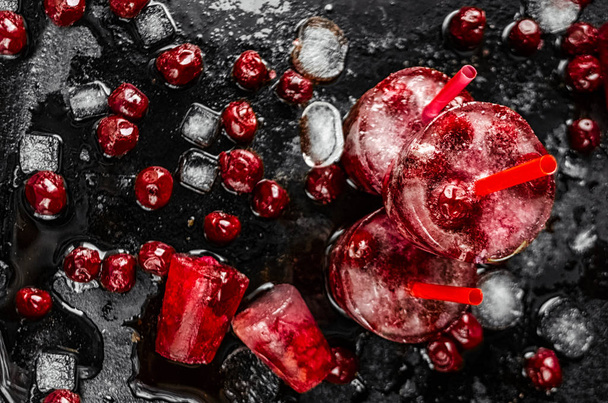 A lot of frozen cherries and ice. Berry ice cream - Foto, immagini
