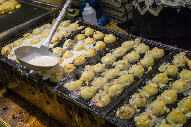 Prozess des Kochens takoyaki - Foto, Bild