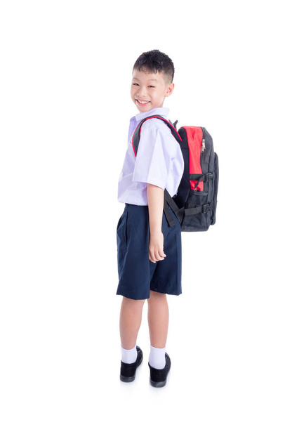 schoolboy standing over white background - 写真・画像