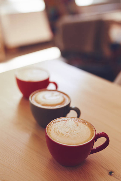 Three cups of cappuccino - Фото, зображення
