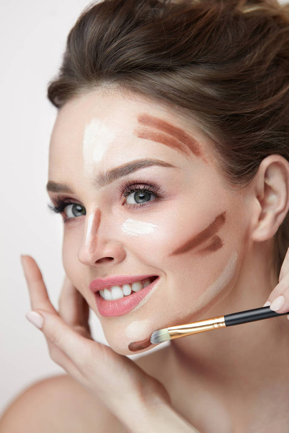 Woman Face Makeup. Closeup Of Female With Contouring Lines - Foto, immagini