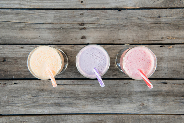fruit milkshakes in glasses with drinking straws - Photo, Image
