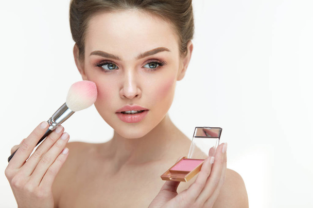 Woman Face Makeup. Close Up Hands Applying Blush On Female Face - Fotoğraf, Görsel
