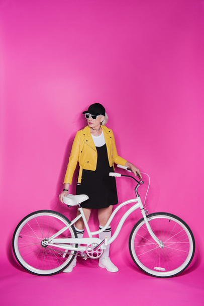senior woman with bicycle - Fotoğraf, Görsel