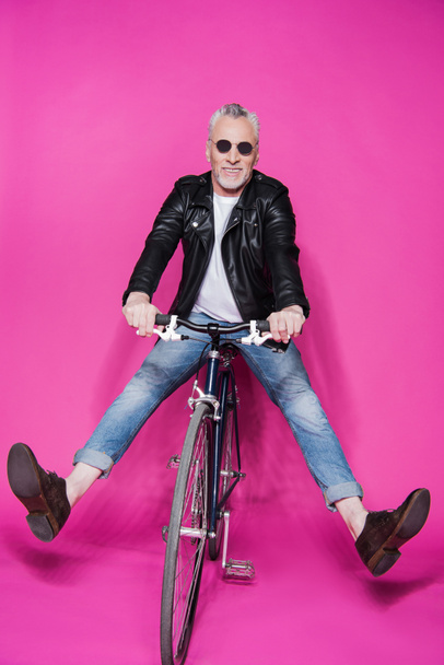 stylish senior man with bicycle - Foto, Imagen