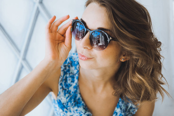 attractive woman in sunglasses - Фото, изображение