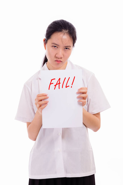 Chinese high school girl showing bad test score - Zdjęcie, obraz