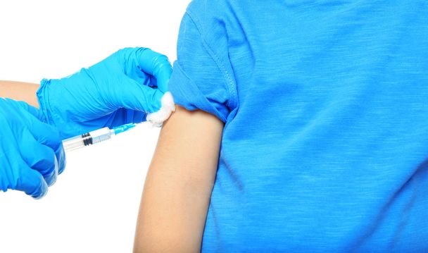 doctor vaccinating boy  - Photo, image