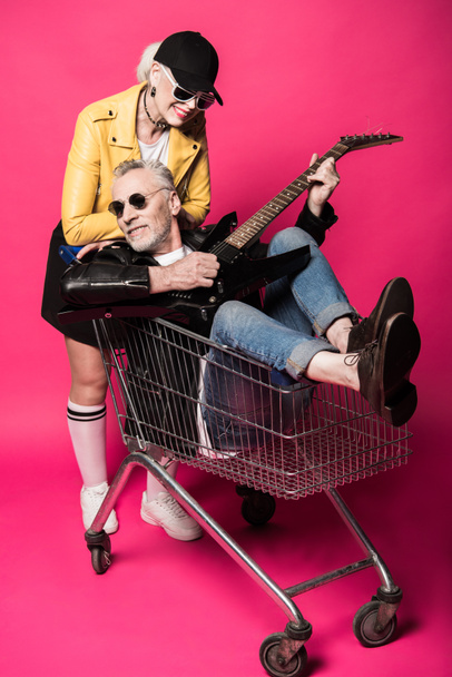 Senior couple with electric guitar  - Fotografie, Obrázek