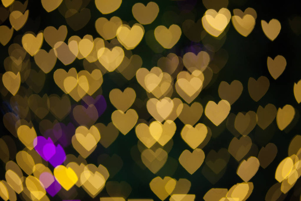 Sarı mor ışıklar kalp bokeh arka plan  - Fotoğraf, Görsel