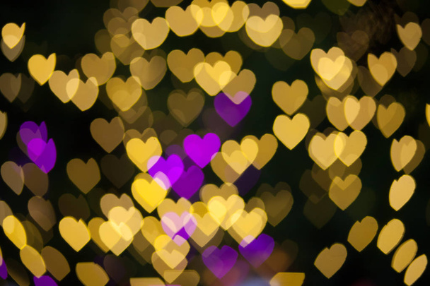 Abstract Yellow Purple lights Heart bokeh background  - Fotografie, Obrázek