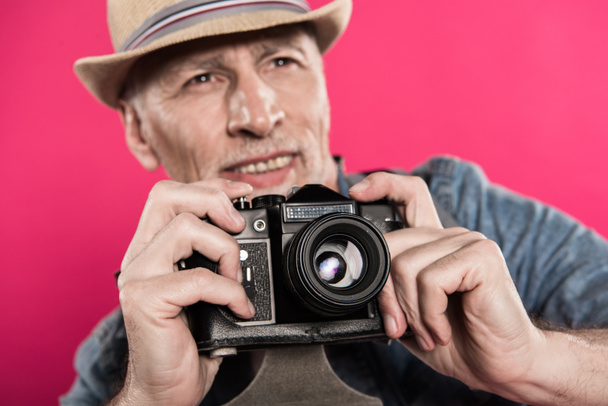 man with retro photo camera - Photo, Image