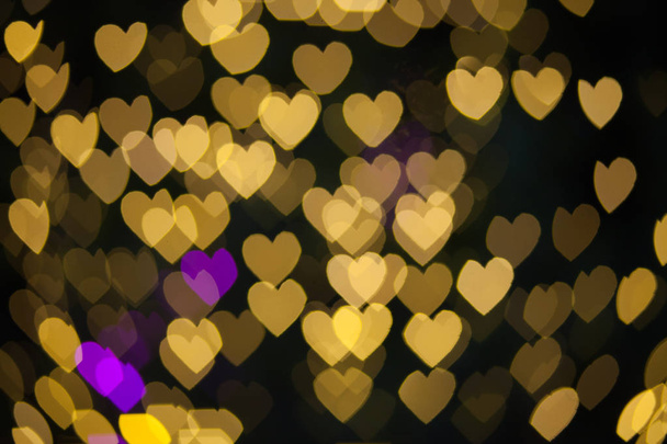 Sarı mor ışıklar kalp bokeh arka plan  - Fotoğraf, Görsel