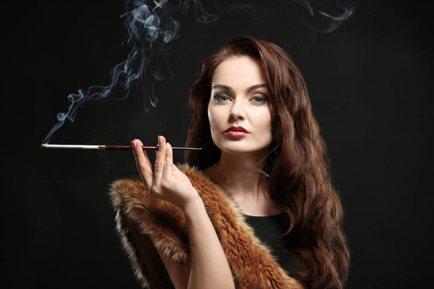 woman smoking cigar - Фото, зображення