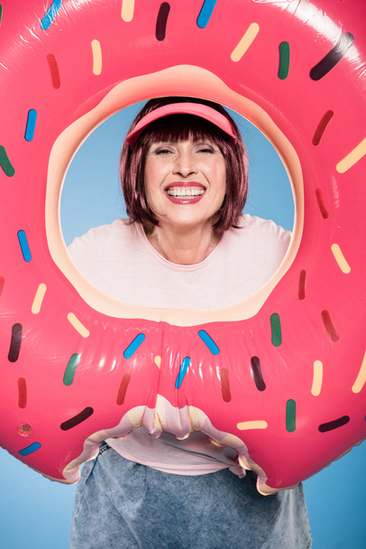 smiling woman holding float ring - Photo, Image