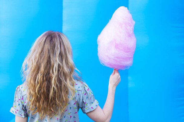 woman with cotton candy  - Foto, Imagem