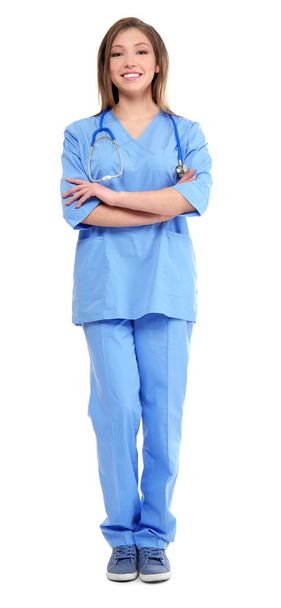 Όμορφη νεαρή γυναίκα γιατρό σε λευκό φόντο - Φωτογραφία, εικόνα