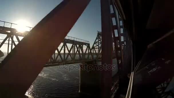 view from the train window passing through a broad river - Filmmaterial, Video
