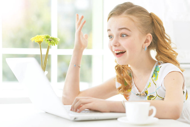 little girl with modern laptop - Photo, Image