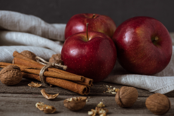 red apples and cinnamon sticks - Photo, Image