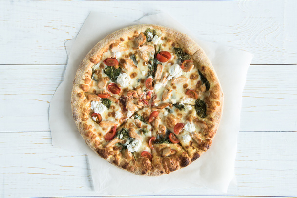 italian pizza on baking paper - Photo, Image
