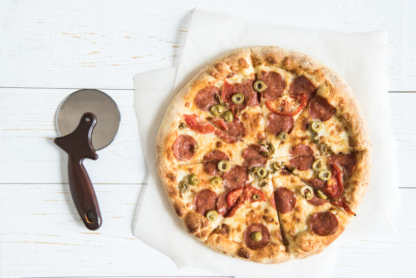 olasz pizzák, pizza vágó - Fotó, kép
