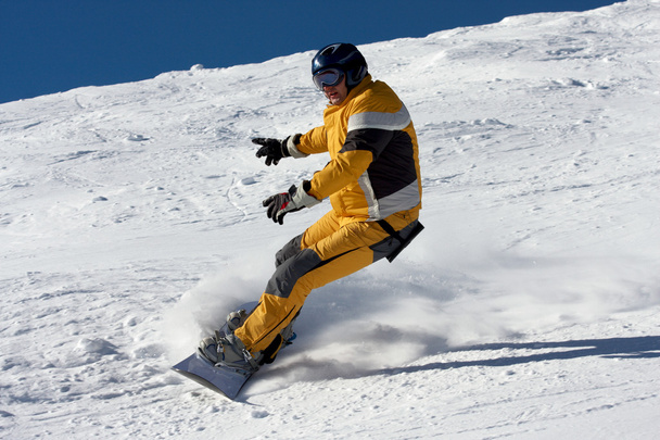 Snowboard en suite amarilla
 - Foto, imagen