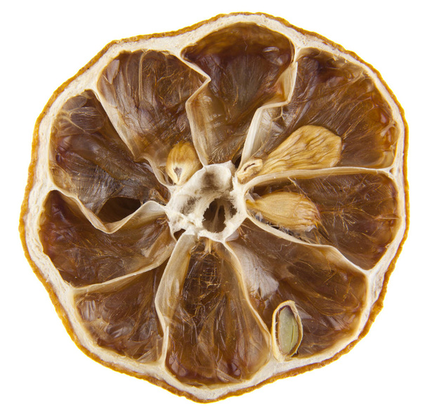 Limão seco sobre fundo branco
 - Foto, Imagem
