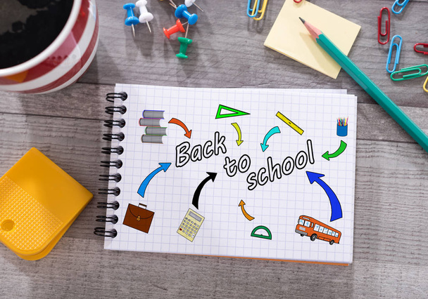 Back to school concept on a notepad - Фото, зображення