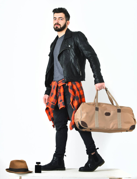 Bearded man, caucasian hipster with moustache holding stylish bag - Фото, изображение